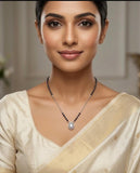 Woman wearing a necklace with a neutral background