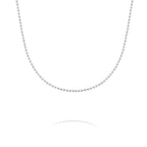 Silver beaded necklace on a white background