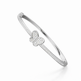 Silver bracelet with butterfly charm on a white background