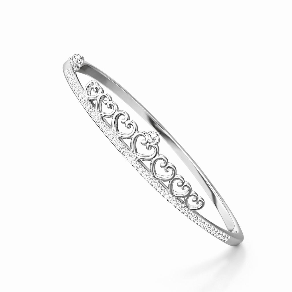 Silver bracelet with heart designs on a white background
