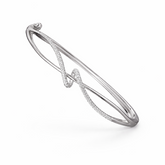Silver bracelet with a wave design on a white background