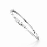 Silver bracelet with heart design on a white background