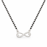 Necklace with an infinity symbol pendant on a white background