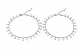 Pair of silver payal with teardrop-shaped beads on a white background