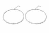 Two silver tennis payal on a white background