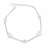 Silver bracelet with heart-shaped charms on a white background