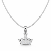 Silver crown pendant necklace on a white background