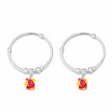 silver baby kada with ganesha charms on a white background