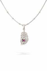 Silver necklace with a morpankh pendant featuring a red gemstone on a white background