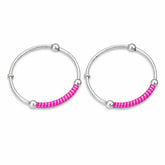 Silver kada with pink beads on a white background