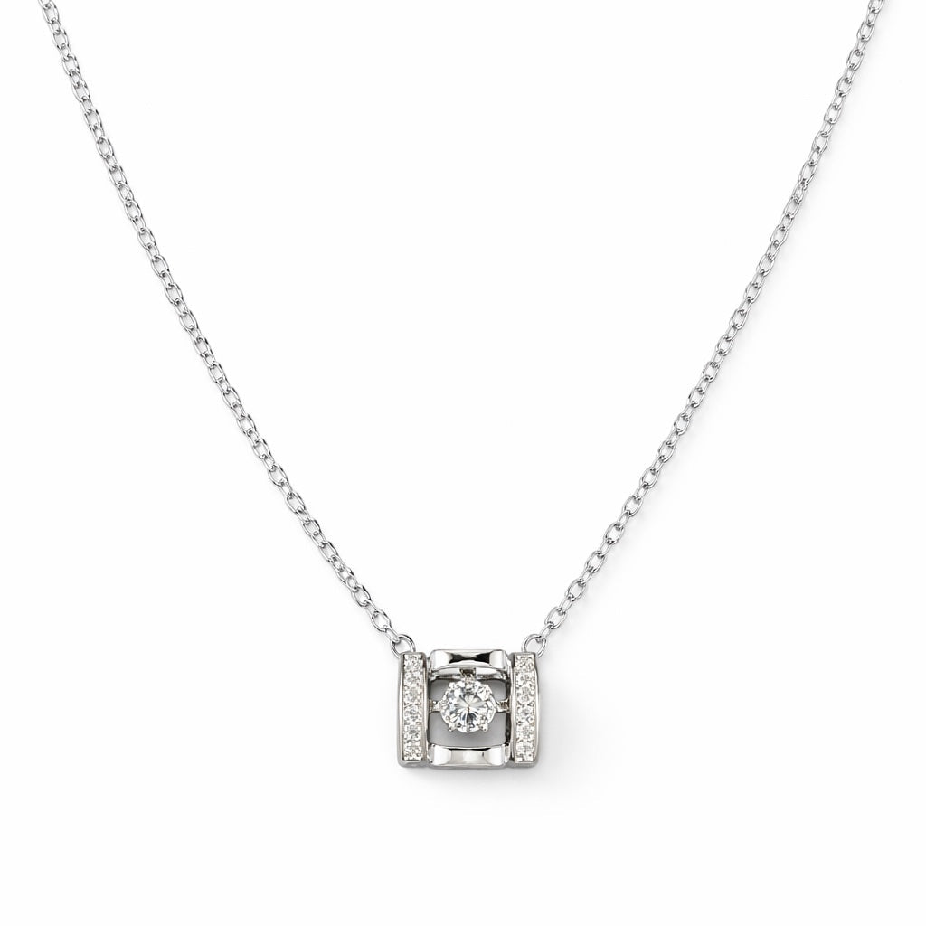 Silver necklace with a diamond pendant on a white background