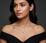 Woman wearing a necklace with a dark background