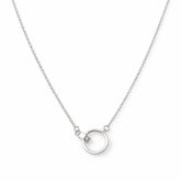 Silver necklace with a small circular pendant on a white background