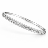Silver bracelet with small stones on a white background