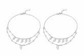 Two silver layered anklet with leaf-shaped charm on a white background