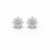 Pair of diamond flower earrings on a white background