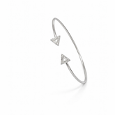 Silver kada with triangle design on a white background
