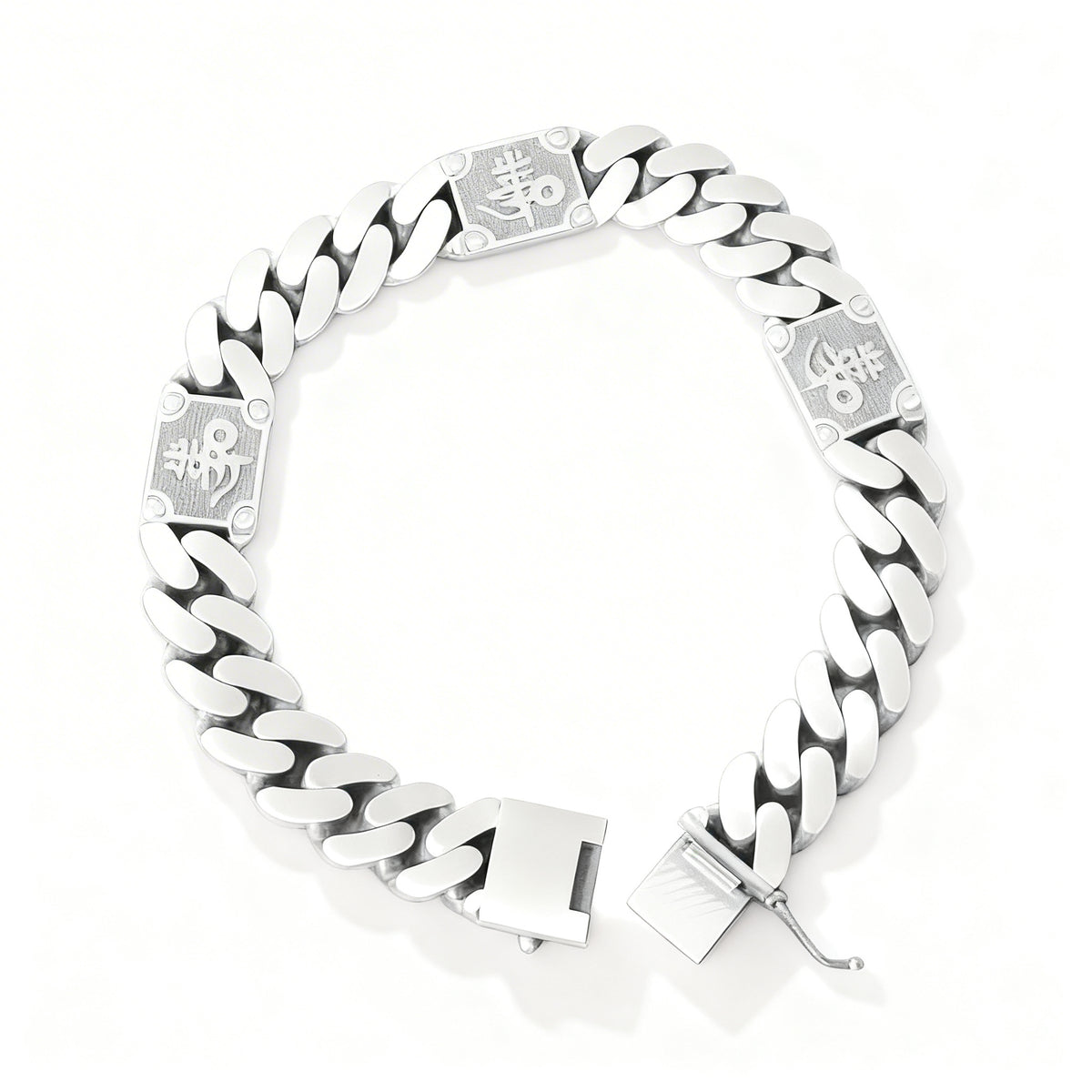 Silver chain bracelet with engraved design on a white background
