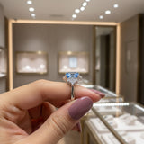 Zaviraa Emerald Cut Aquamarine Halo Engagement Ring for Women – 925 Sterling Silver Floral Moissanite Accent Ring | Elegant Proposal Ring