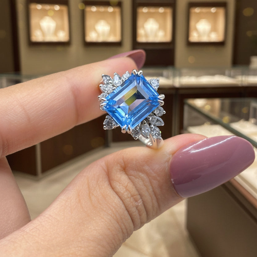 Zaviraa Emerald Cut Aquamarine Halo Engagement Ring for Women – 925 Sterling Silver Floral Moissanite Accent Ring | Elegant Proposal Ring