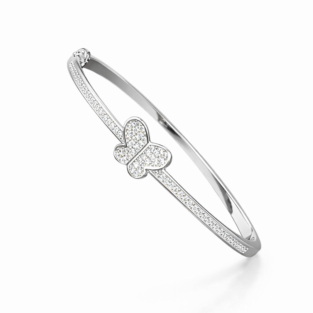 Silver bracelet with butterfly charm on a white background
