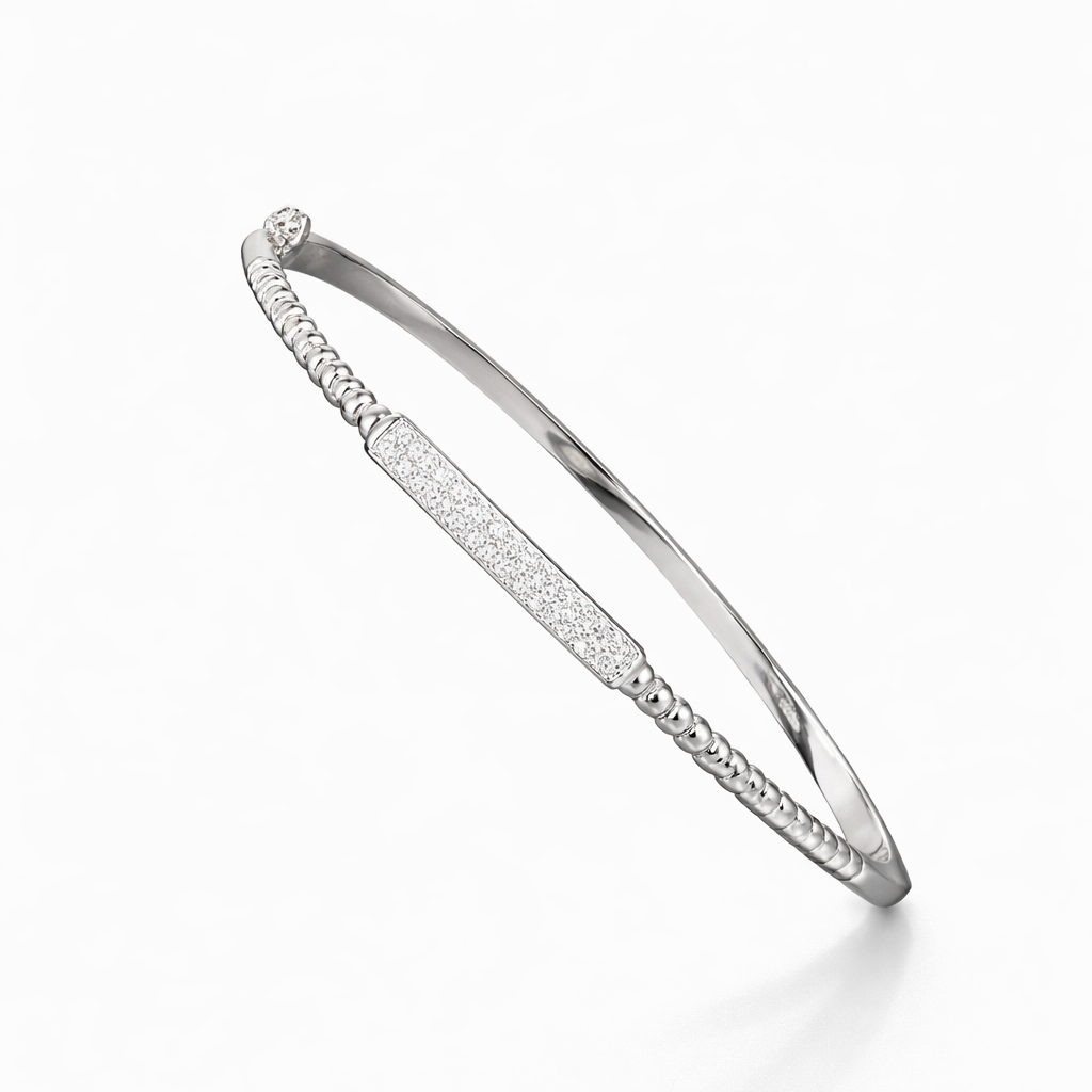 Silver bracelet with small stones on a white background