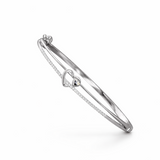 Silver bracelet with heart design on a white background