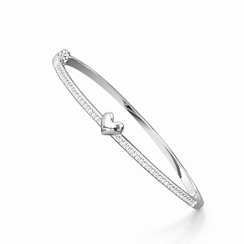 Silver bracelet with a heart charm on a white background