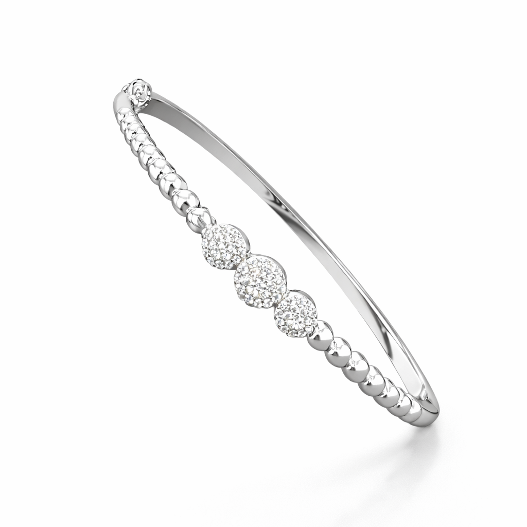Silver bracelet with small diamonds on a white background