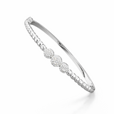 Silver bracelet with small diamonds on a white background