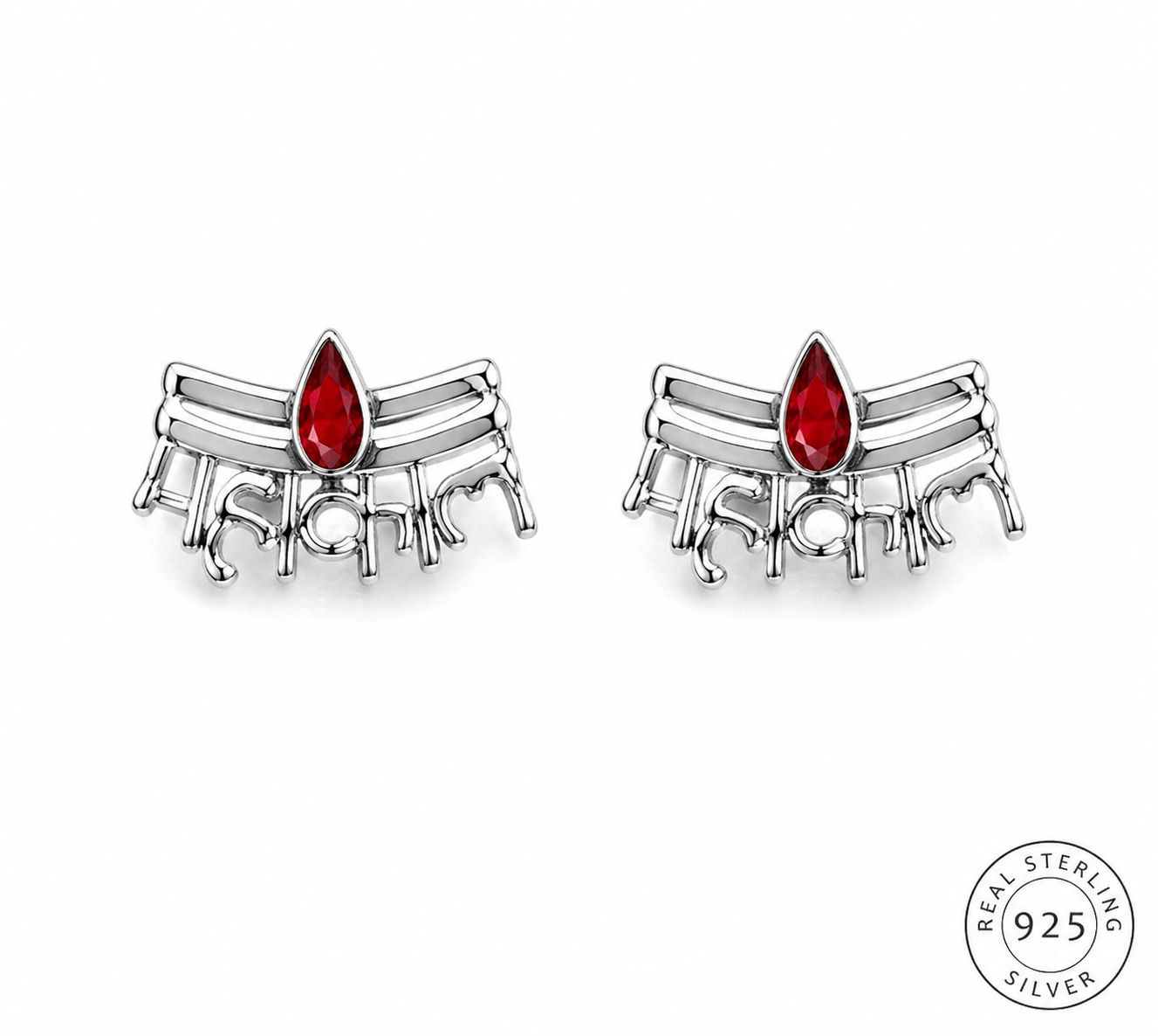 Silver earrings with red gemstones on a white background