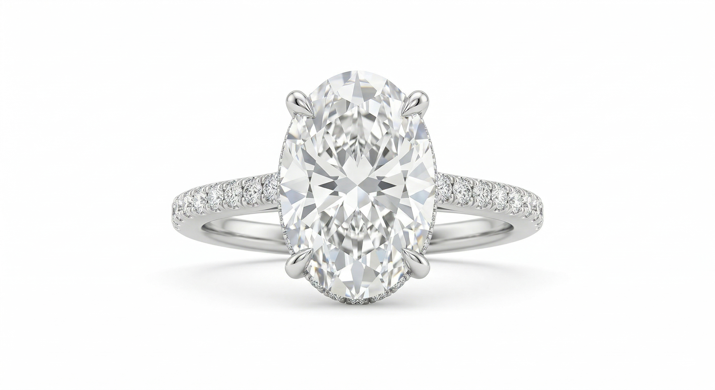 Diamond ring with a large central gemstone on a white background