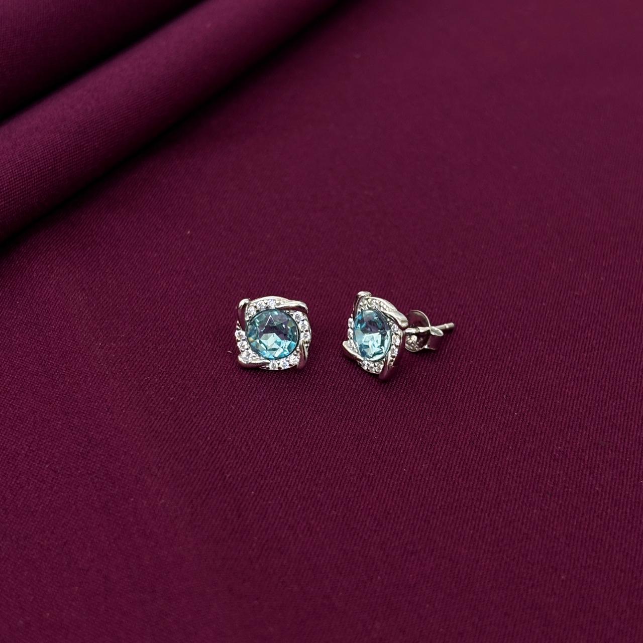 Aqua Blue Twisted Halo Stud Earrings in 925 Sterling Silver