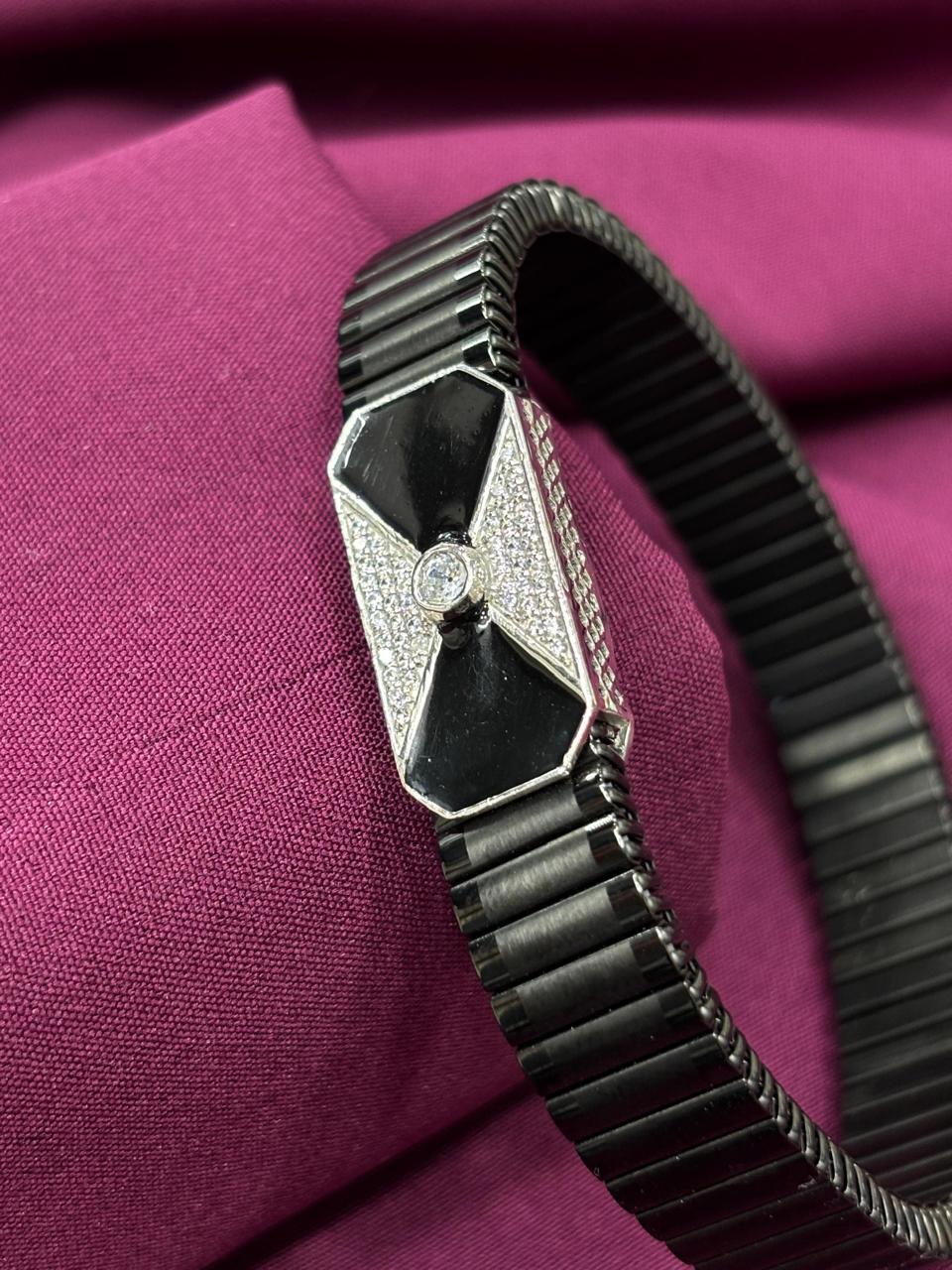 Zaviraa 'Obsidian Bow' Black Onyx and Diamond Accent Modular Stretch Bracelet in Sterling Silver