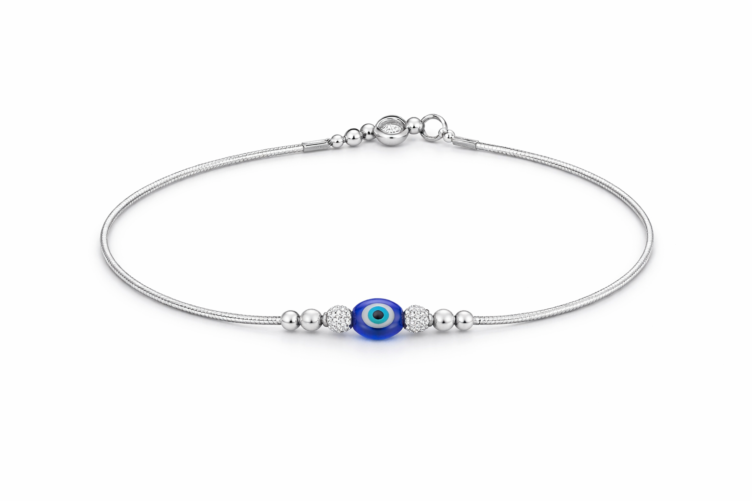 Silver payal with a blue evil eye charm on a white background