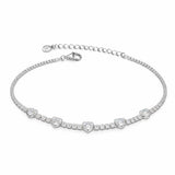 Silver bracelet with floral designs on a white background