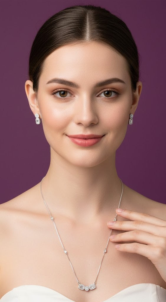 Woman wearing a necklace and earrings against a purple background