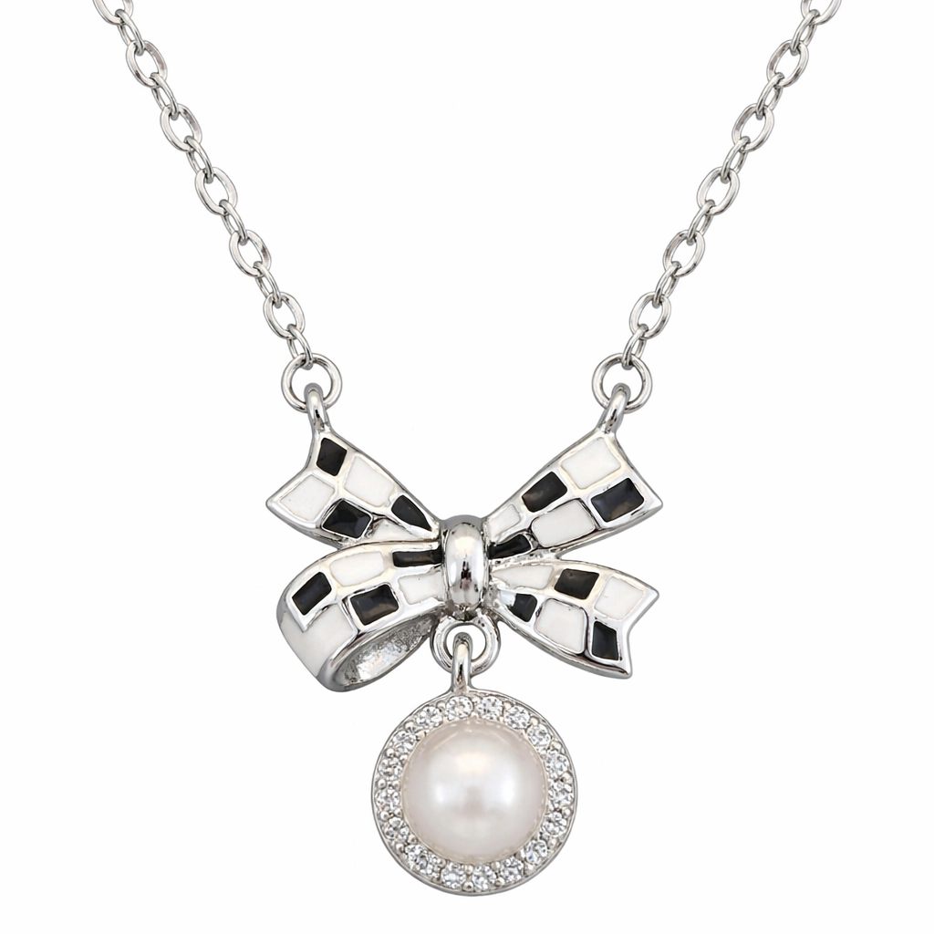 Silver bow-shaped necklace with a pearl pendant on a white background