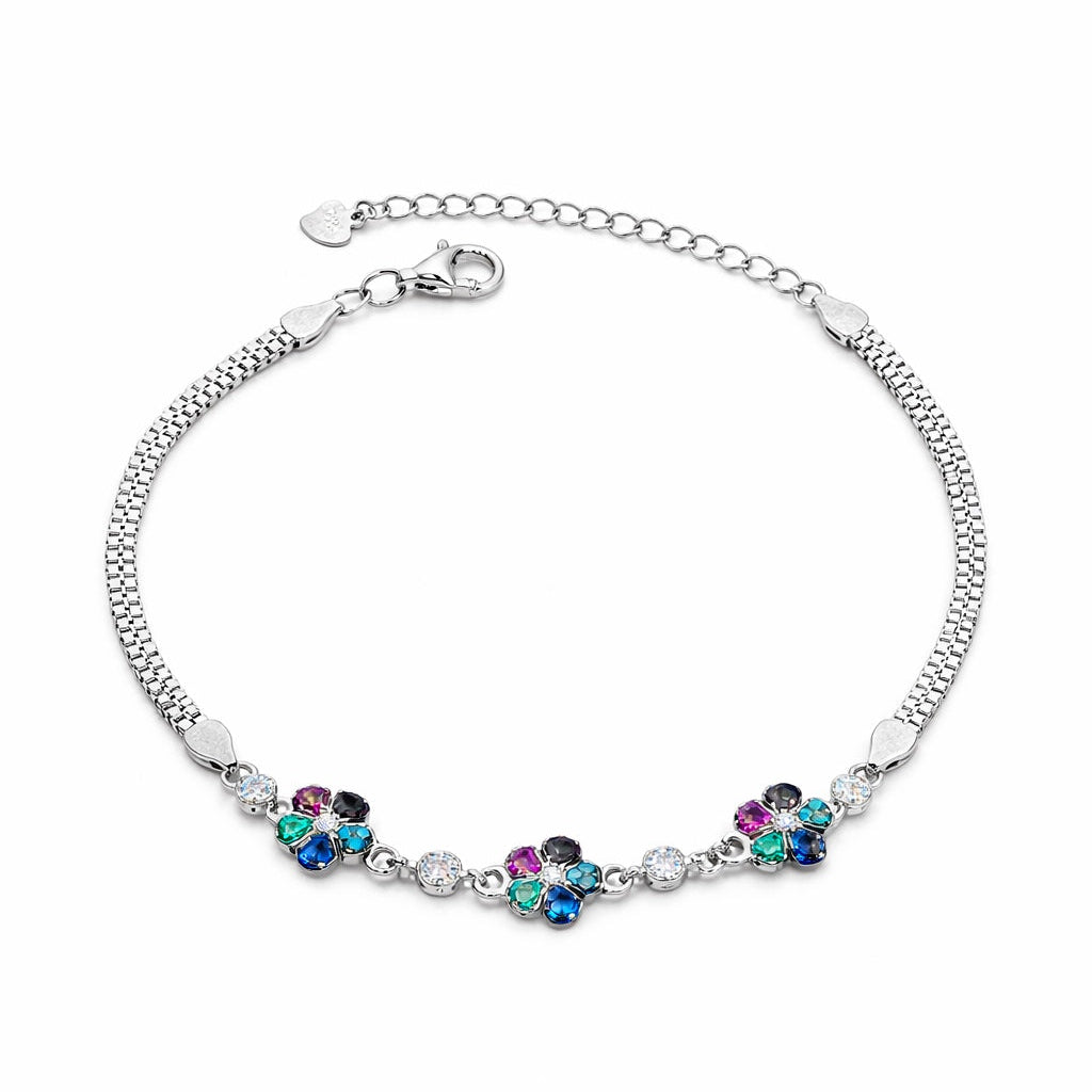 Silver bracelet with colorful gemstones on a white background