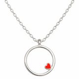 Silver necklace with a red heart pendant on a white background