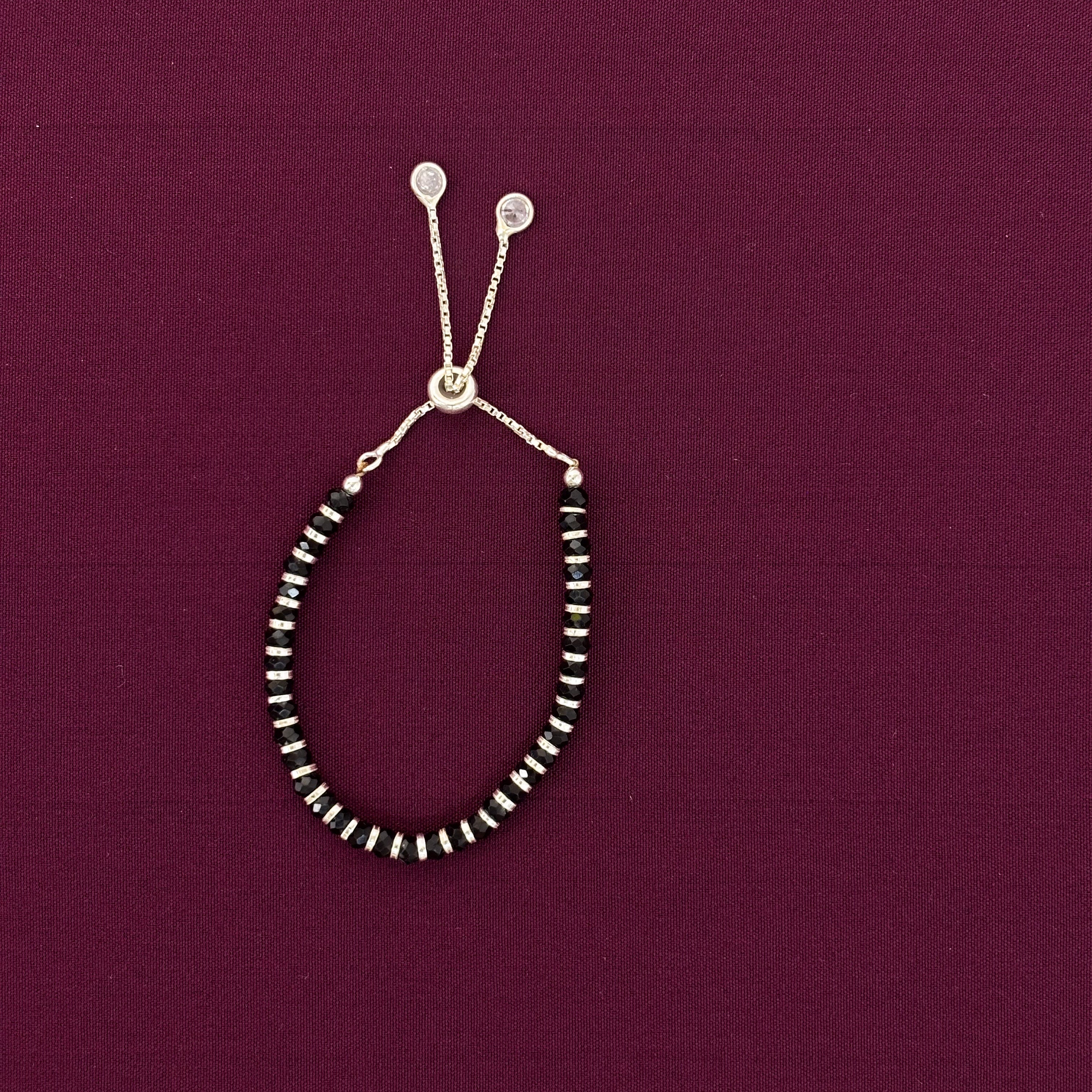 Beaded bracelet on a maroon background