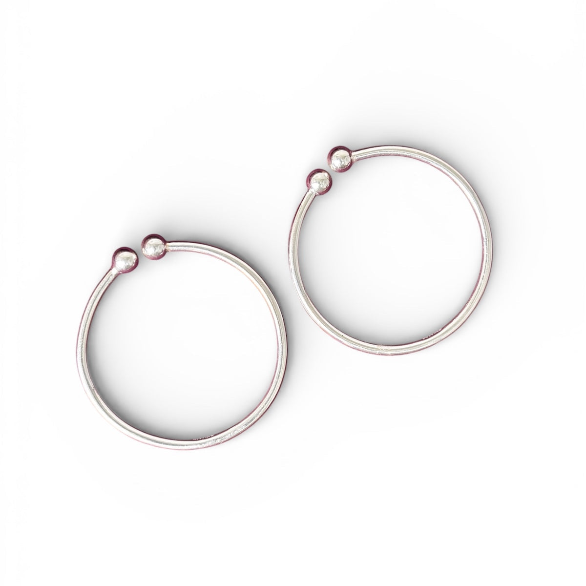 silver plain kada on white background