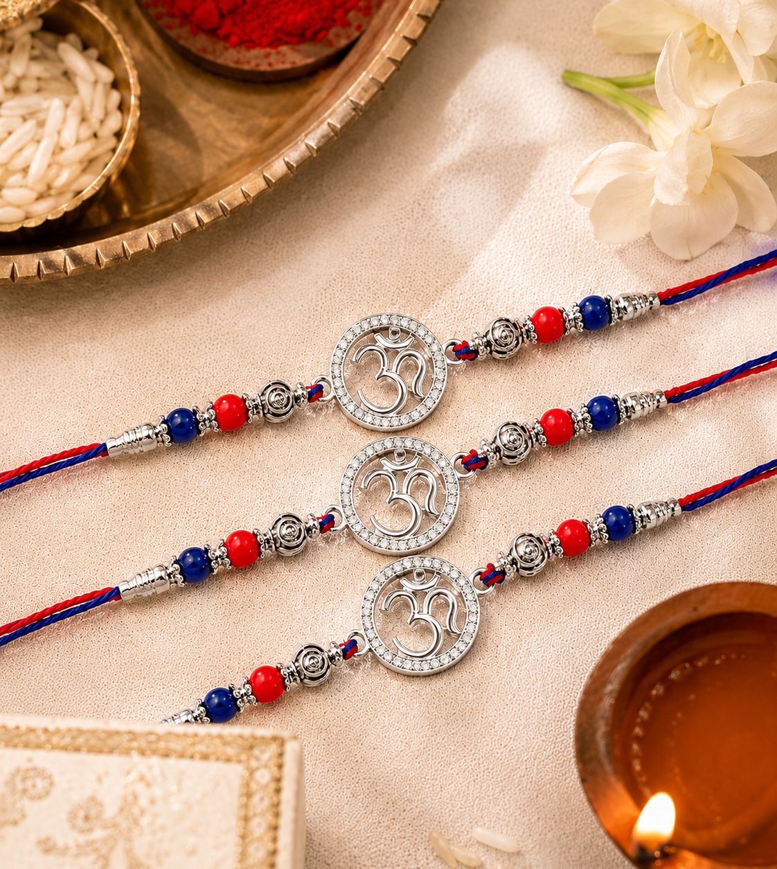 silver-om-rakhi-trio