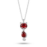 Cat-shaped necklace with red gemstones on a white background