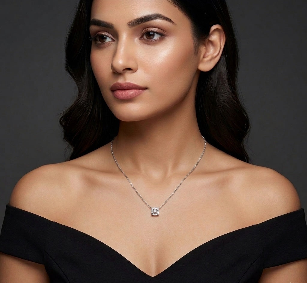Woman wearing a necklace with a dark background