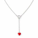 Necklace with a red heart pendant and clear crystal on a white background