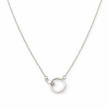 Silver necklace with a small circular pendant on a white background