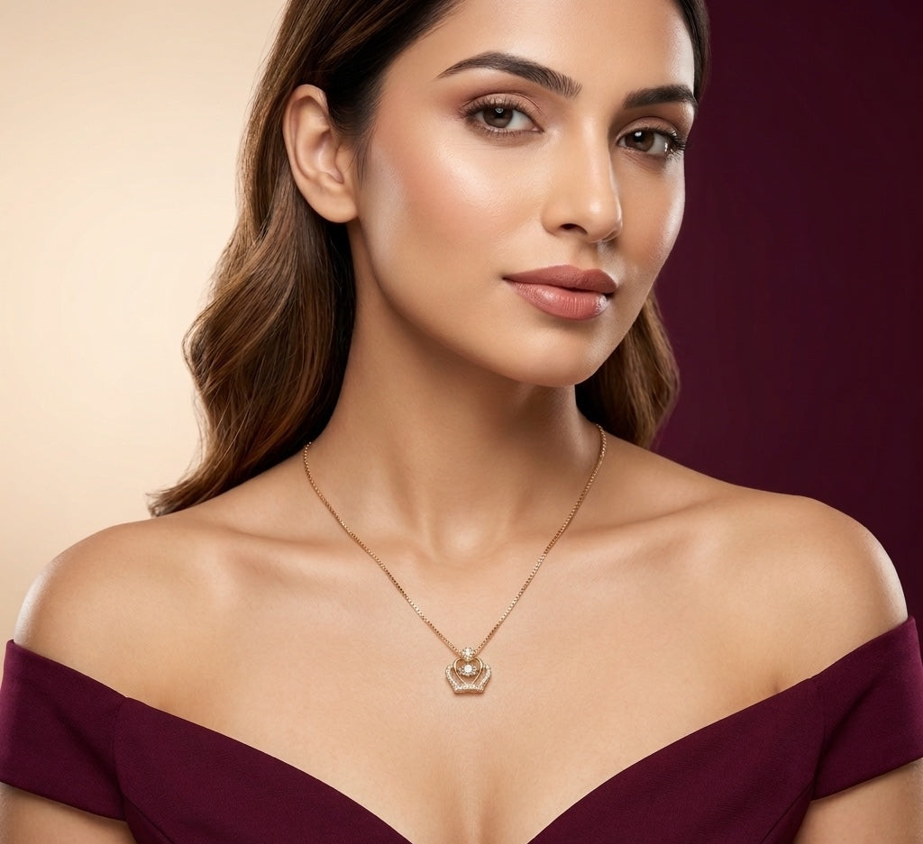 Woman wearing a gold necklace against a gradient background