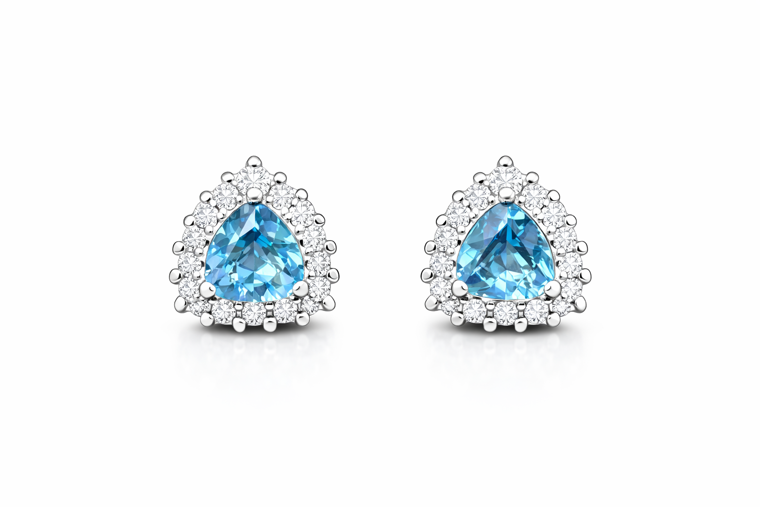 Pair of earrings with blue gemstones on a white background