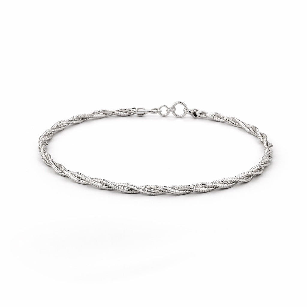 Silver braided bracelet on a white background